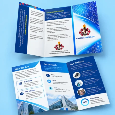 Brochure Printing Open tri-fold business brochure displaying outer cover panels and inner informational sections with blue geometric accents, contact details, vision statements, and project highlights against a light blue background.